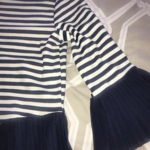 Beautiful blouse. White with Navy strips.